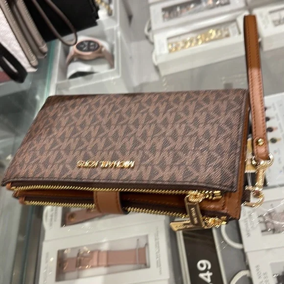 MICHAEL KORS LARGE DOUBLE ZIP WRISTLET PHONEHOLDER WALLET CLUTCH 
Brown - Picture 6 of 16